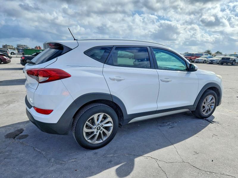 Photo 3 from auction – 2017 HYUNDAI TUCSON with VIN KM8J33A47HU294530