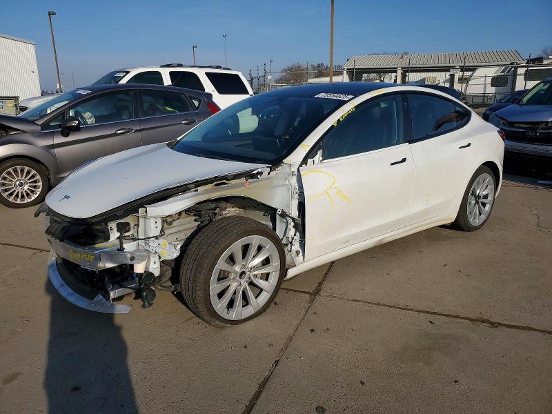TESLA MODEL 3 2022 with VIN 5YJ3E1EA2NF184940 - Photo from auction