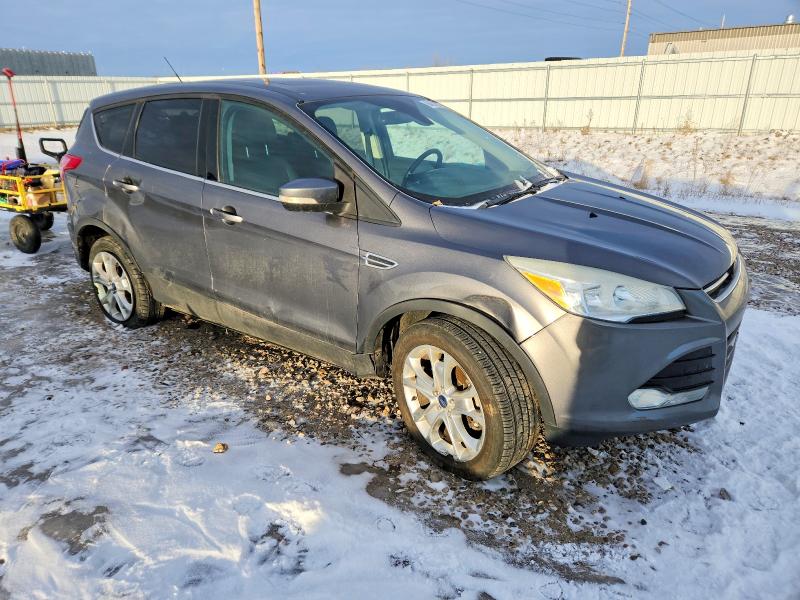 Photo 4 from auction – 2013 FORD ESCAPE with VIN 1FMCU9HX3DUC37101