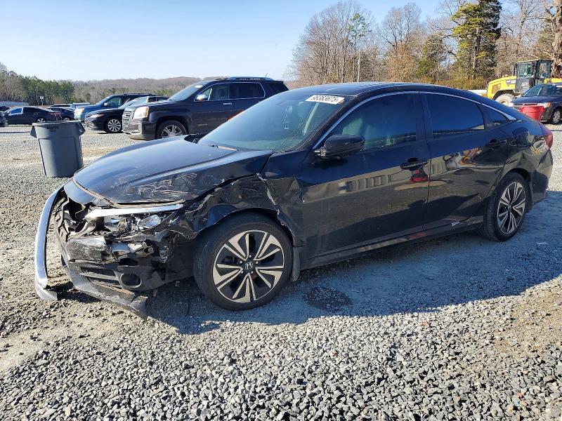 HONDA CIVIC EX 2017 with VIN 2HGFC1F38HH656979 - Photo from auction