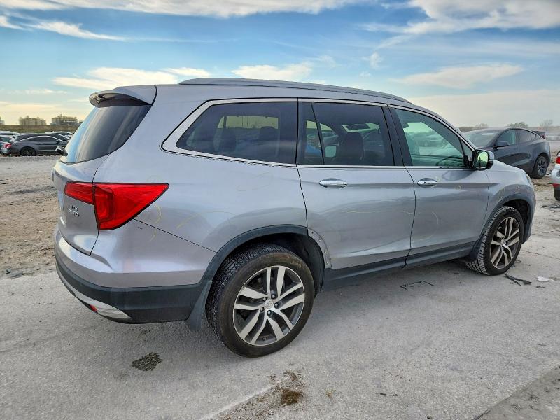 Photo 3 from auction – 2016 HONDA PILOT ELIT with VIN 5FNYF6H08GB128331