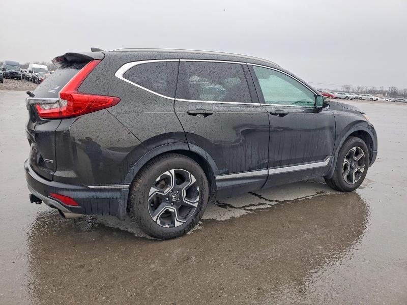 Photo 3 from auction – 2017 HONDA CR-V with VIN 7FARW1H97HE030581