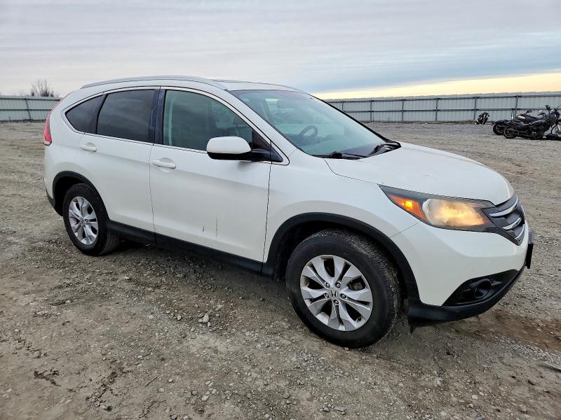 Photo 4 from auction – 2014 HONDA CR-V EXL with VIN 5J6RM4H79EL042364