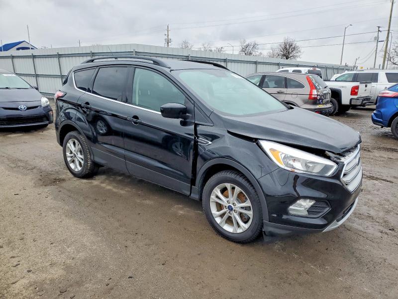 Photo 4 from auction – 2018 FORD ESCAPE SE with VIN 1FMCU9GD9JUD36301