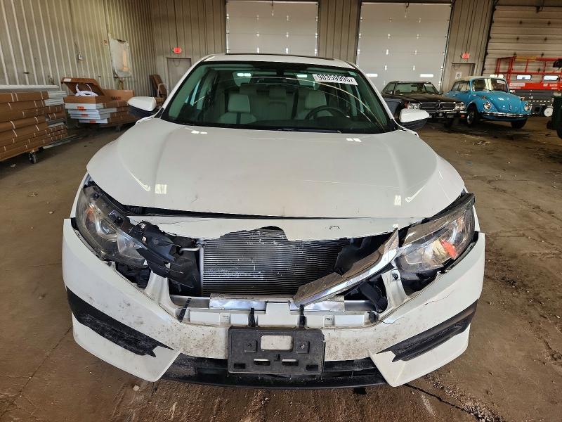 Photo 5 from auction – 2016 HONDA CIVIC EX with VIN 19XFC2F74GE054355