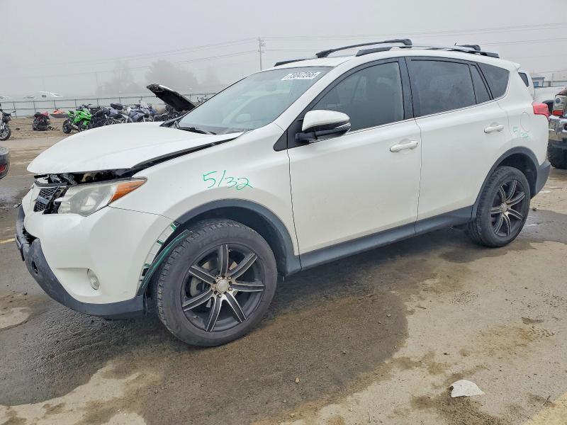TOYOTA RAV4 XLE 2014 with VIN JTMRFREV0EJ009281 - Photo from auction