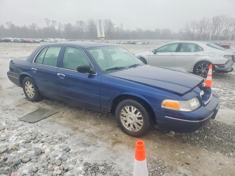 Photo 4 from auction – 2004 FORD CROWN VICT with VIN 2FAFP74W24X103317