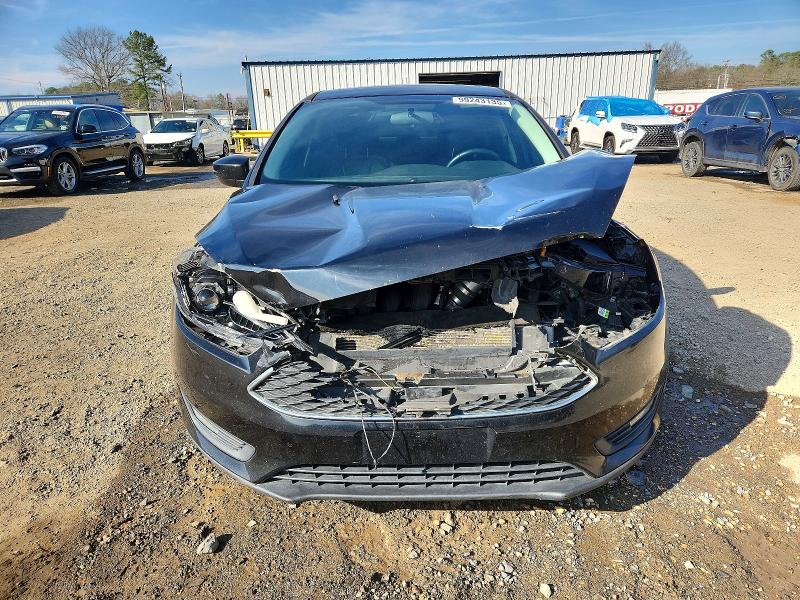 Photo 5 from auction – 2016 FORD FOCUS with VIN 1FADP3F29GL393065