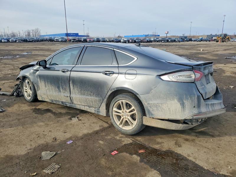 Photo 2 from auction – 2015 FORD FUSION TIT with VIN 3FA6P0RU3FR178852