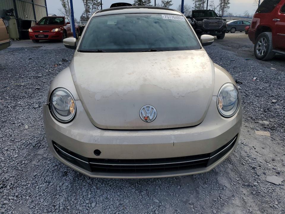 Photo 5 from auction – 2012 VOLKSWAGEN BEETLE with VIN 3VWJP7AT6CM665792