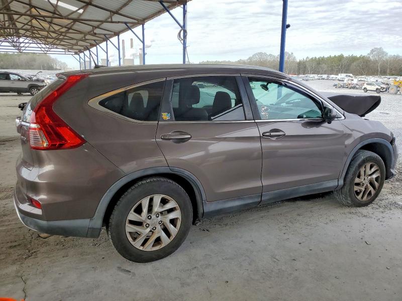 Photo 3 from auction – 2015 HONDA CR-V EXL with VIN 2HKRM4H79FH700258