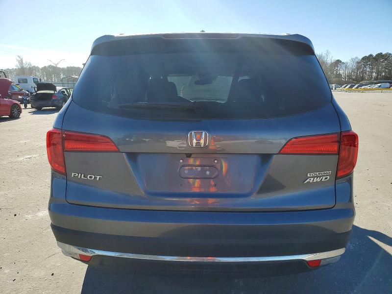 Photo 6 from auction – 2017 HONDA PILOT TOUR with VIN 5FNYF6H98HB012093