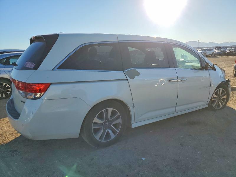 Photo 3 from auction – 2014 HONDA ODYSSEY TO with VIN 5FNRL5H99EB074203