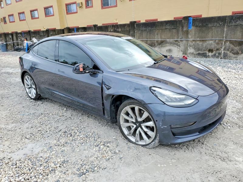Photo 4 from auction – 2018 TESLA MODEL 3 with VIN 5YJ3E1EB7JF076977