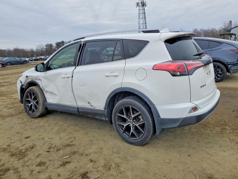 Photo 2 from auction – 2018 TOYOTA RAV4 SE with VIN JTMJFREV2JD241564