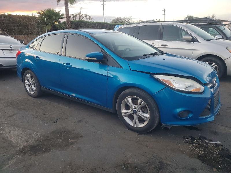 Photo 4 from auction – 2014 FORD FOCUS SE with VIN 1FADP3F23EL432942