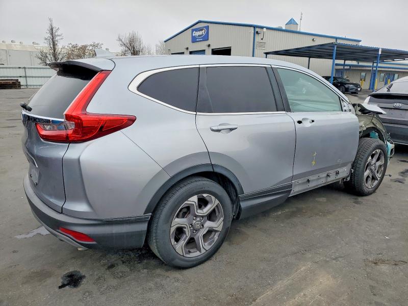Photo 3 from auction – 2017 HONDA CR-V with VIN 7FARW1H51HE037913