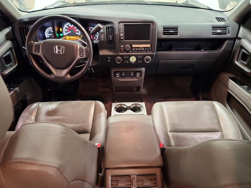 Photo 8 from auction – 2013 HONDA RIDGELINE with VIN 5FPYK1F56DB014912