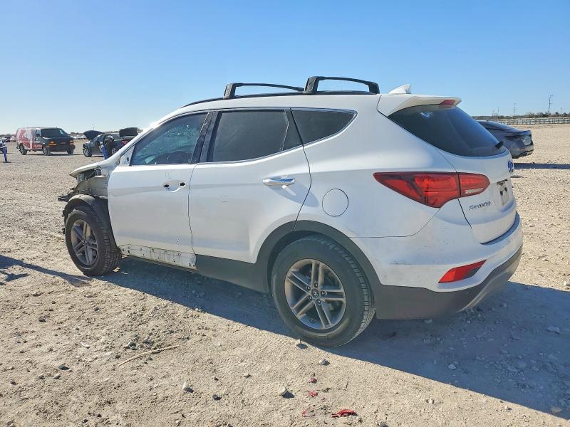 Photo 2 from auction – 2018 HYUNDAI SANTA FE S with VIN 5NMZU3LB4JH065042