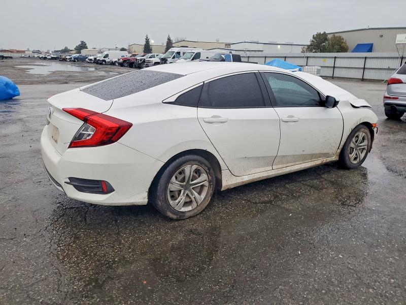 Photo 3 from auction – 2019 HONDA CIVIC LX with VIN 19XFC2F61KE203255