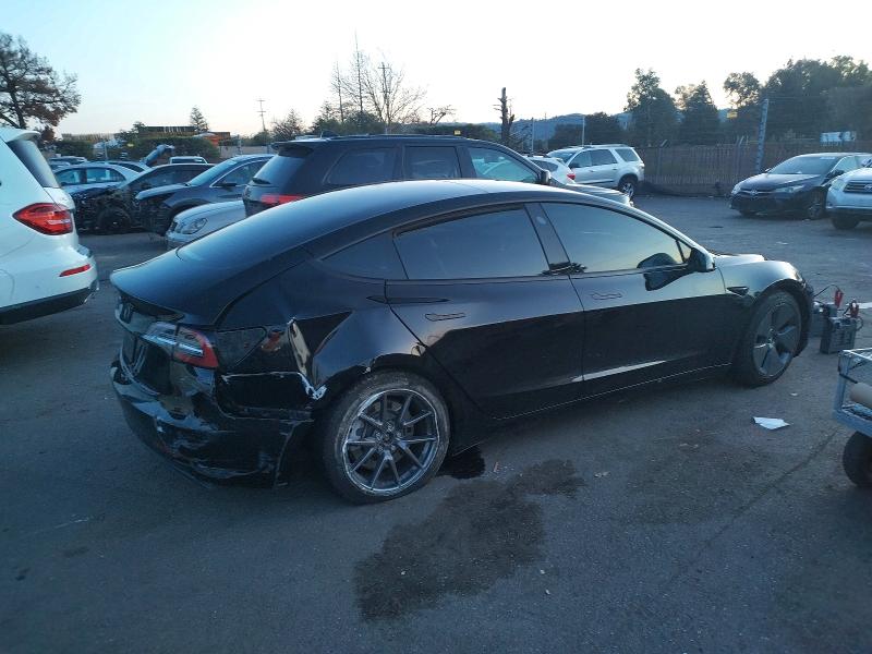 Photo 3 from auction – 2023 TESLA MODEL 3 with VIN 5YJ3E1EA4PF498155