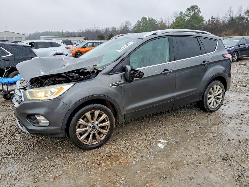 FORD ESCAPE TIT 2017 с VIN 1FMCU0J90HUB30875 - Фото с аукциона