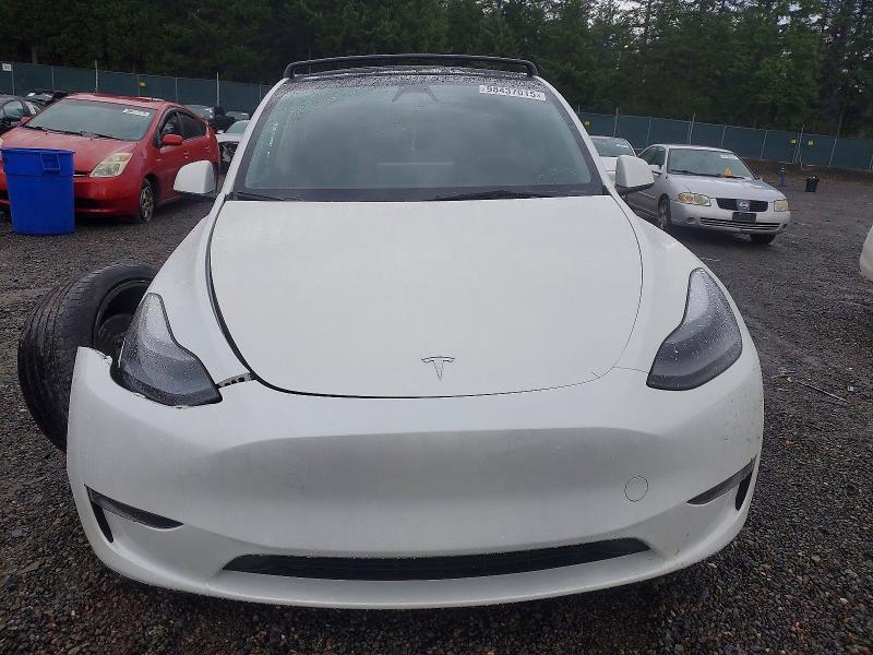 Photo 5 from auction – 2023 TESLA MODEL Y with VIN 7SAYGAEE5PF871273