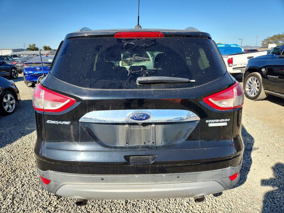 Photo 6 from auction – 2016 FORD ESCAPE TIT with VIN 1FMCU0J97GUC14092