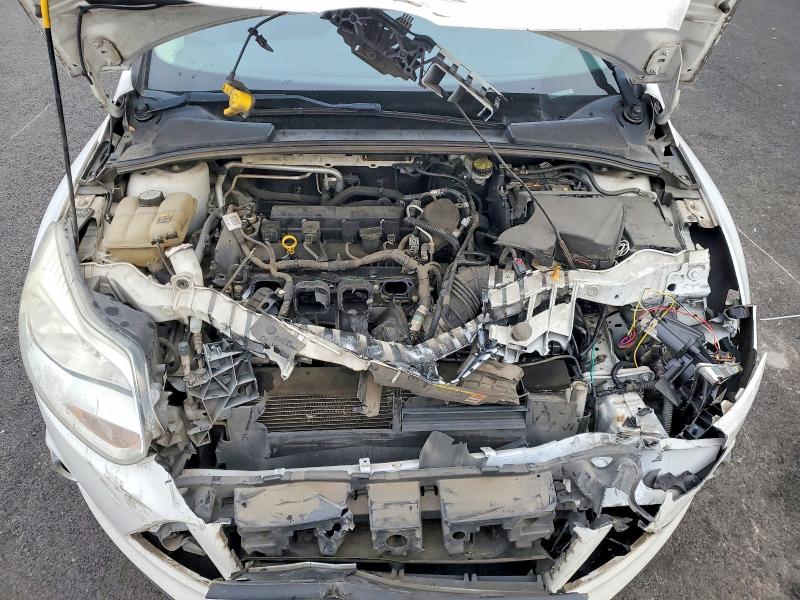 Photo 11 from auction – 2012 FORD FOCUS S with VIN 1FAHP3E29CL141409