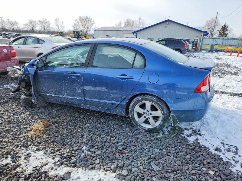 Photo 2 from auction – 2011 HONDA CIVIC LX-S with VIN 19XFA1F6XBE038368