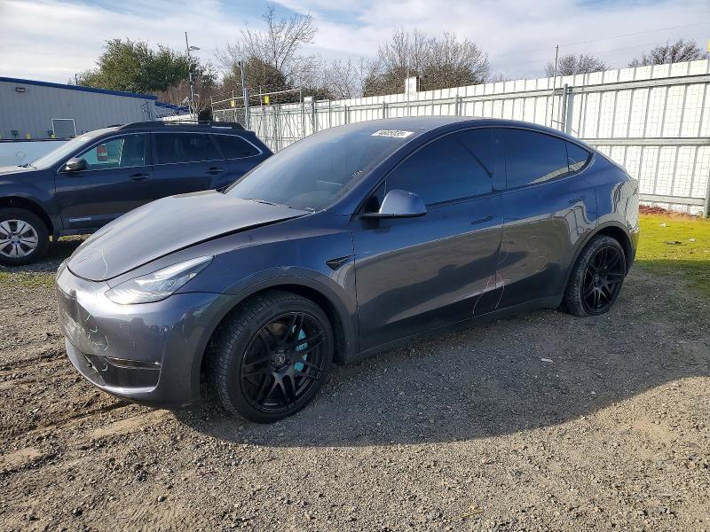 TESLA MODEL Y 2021 with VIN 5YJYGDEE4MF302828 - Photo from auction