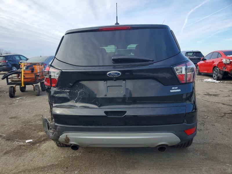 Photo 6 from auction – 2017 FORD ESCAPE with VIN 1FMCU0GD0HUC04209