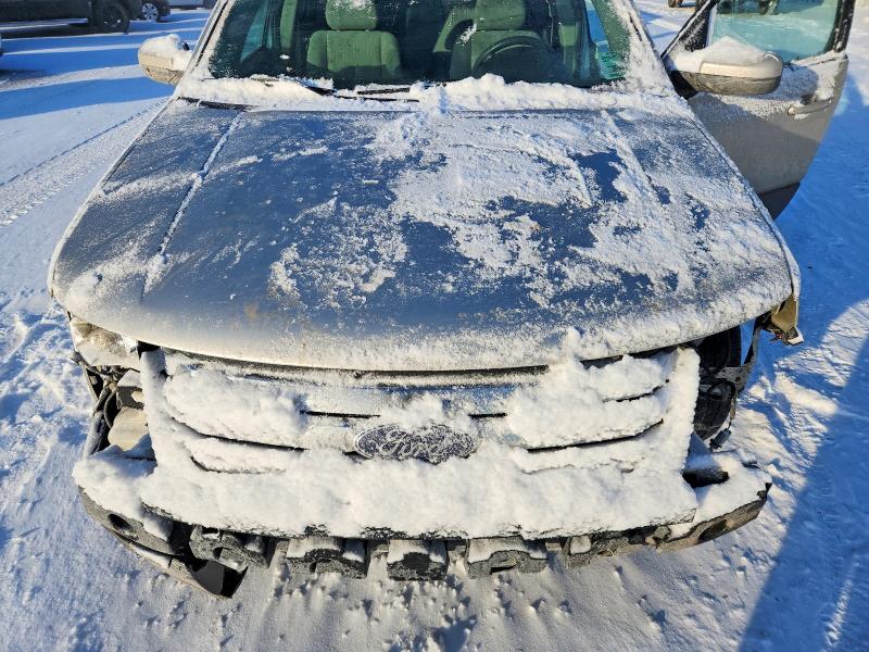 Photo 12 from auction – 2008 FORD TAURUS X with VIN 1FMDK02W98GA01708