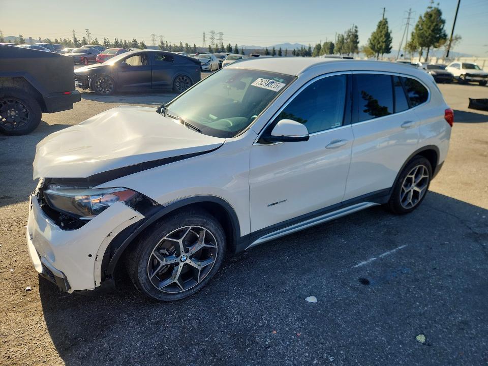 BMW X1 2017 with VIN WBXHU7C31H5H33362 - Photo from auction