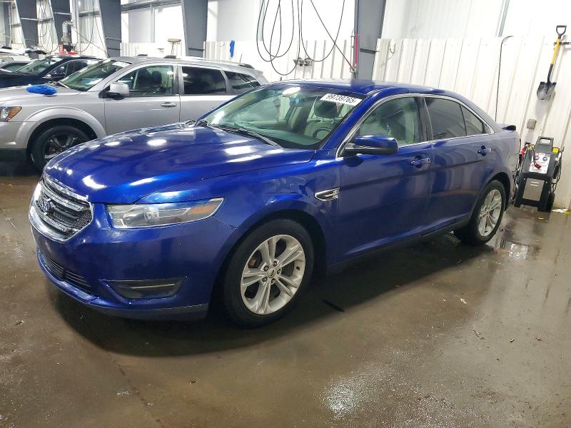 FORD TAURUS 2015 with VIN 1FAHP2E84FG148781 - Photo from auction