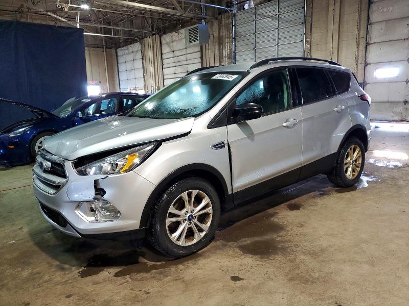 FORD ESCAPE 2018 with VIN 1FMCU0HD7JUD03114 - Photo from auction
