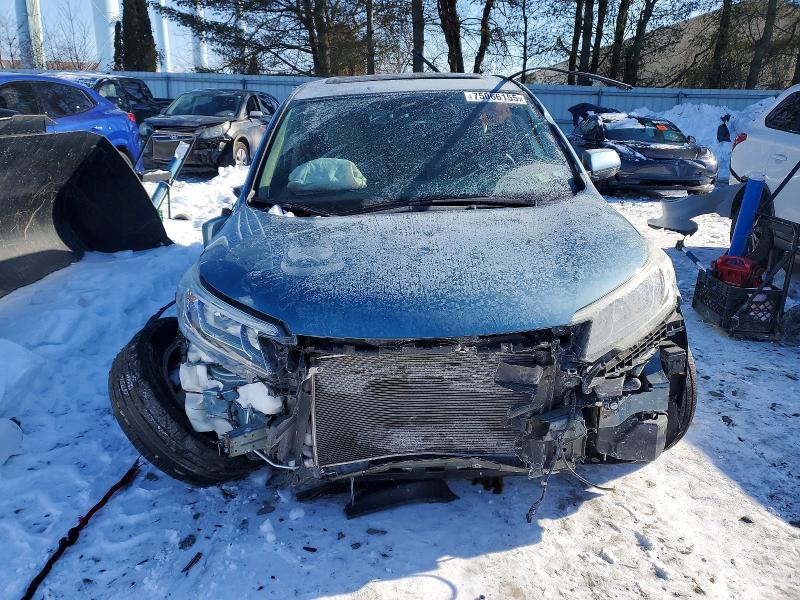 Photo 5 from auction – 2015 HONDA CR-V EX with VIN 2HKRM4H55FH611429