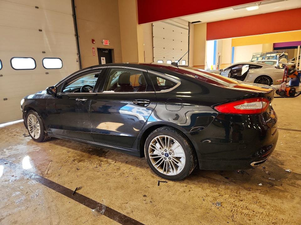 Photo 2 from auction – 2016 FORD FUSION SE with VIN 3FA6P0T99GR181695