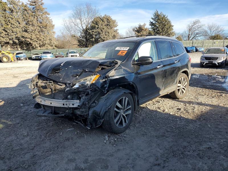HONDA PILOT TOUR 2016 with VIN 5FNYF5H94GB050784 - Photo from auction