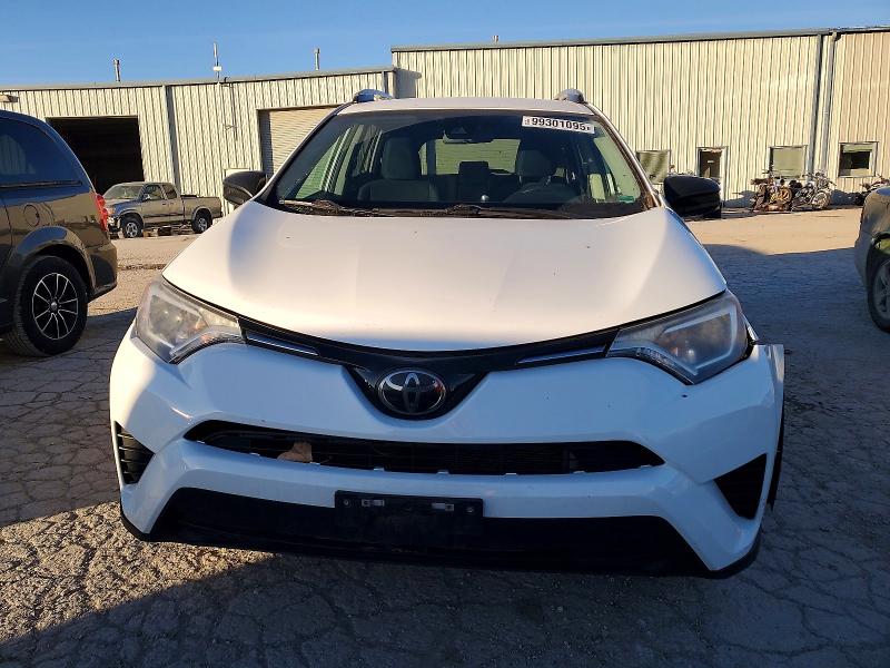 Photo 5 from auction – 2018 TOYOTA RAV4 with VIN 2T3ZFREV5JW415875