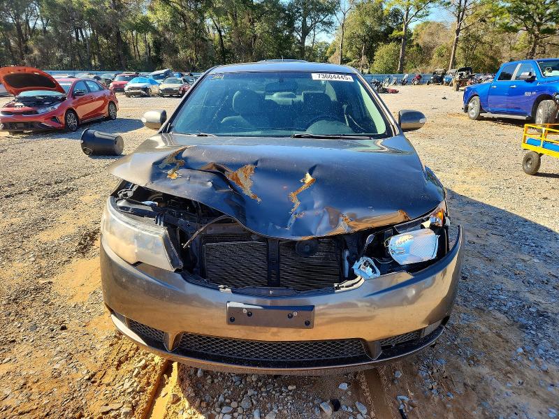 Photo 5 from auction – 2010 KIA FORTE with VIN KNAFU4A22A5811354