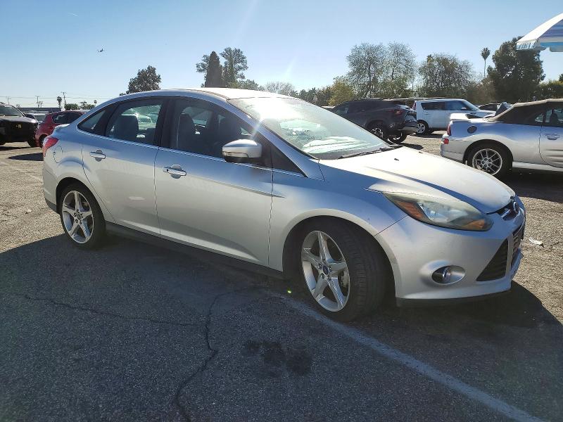 Photo 4 from auction – 2014 FORD FOCUS TITA with VIN 1FADP3J25EL384044