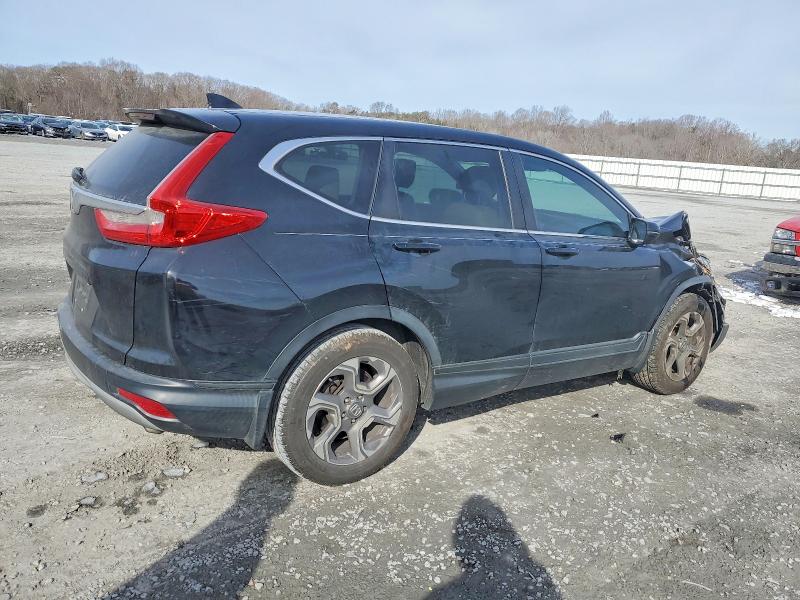 Photo 3 from auction – 2018 HONDA CR-V EXL with VIN 7FARW1H89JE010426