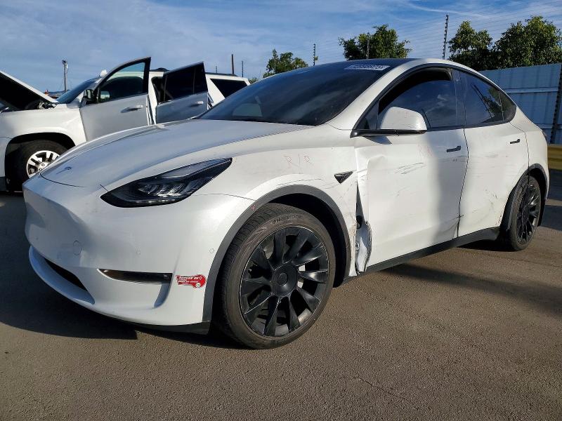 TESLA MODEL Y 2021 with VIN 5YJYGDEEXMF288272 - Photo from auction