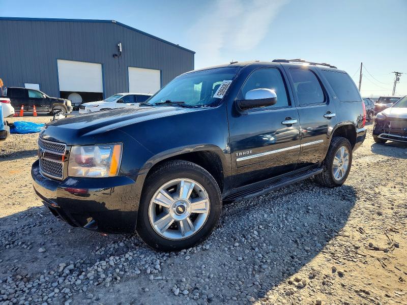 CHEVROLET TAHOE 2010 with VIN 1GNUKCE0XAR223026 - Photo from auction
