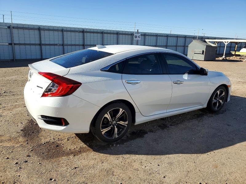 Photo 3 from auction – 2017 HONDA CIVIC TOUR with VIN 19XFC1F99HE030484