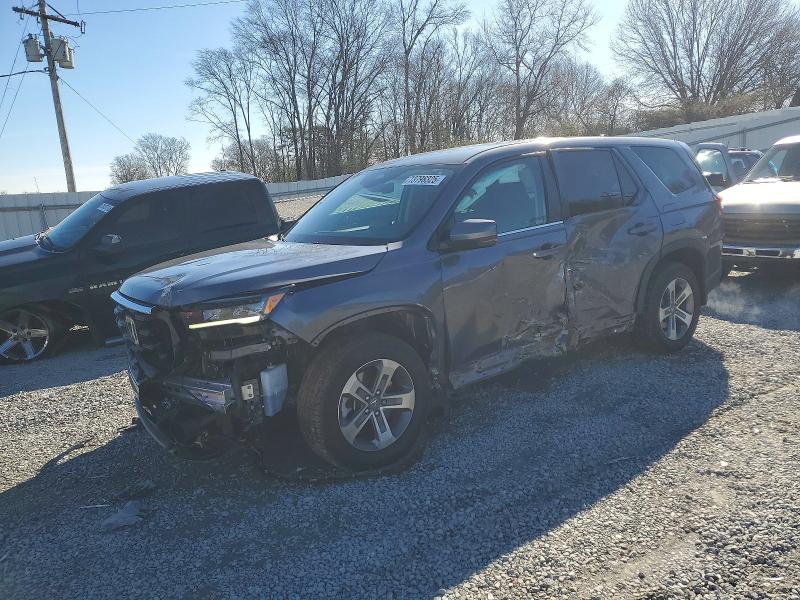 HONDA PILOT EXL 2023 with VIN 5FNYG1H56PB006255 - Photo from auction