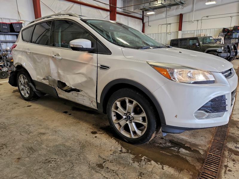 Photo 4 from auction – 2016 FORD ESCAPE TIT with VIN 1FMCU9JX1GUC03754