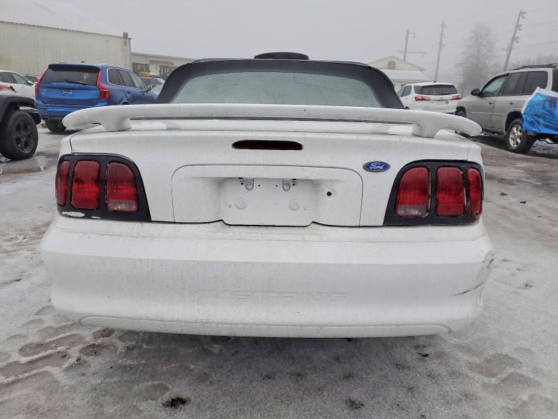 Photo 6 from auction – 1997 FORD MUSTANG with VIN 1FALP4442VF178659