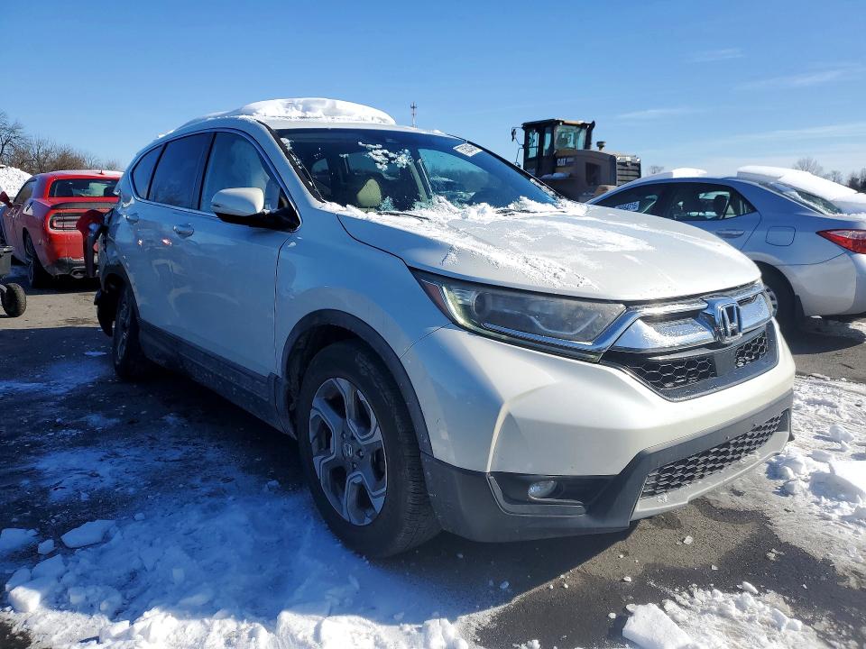 Photo 4 from auction – 2018 HONDA CR-V with VIN 2HKRW1H52JH502010
